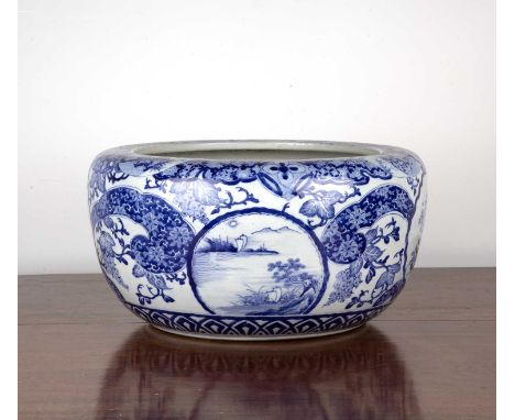 Japanese fish bowl or footbathLate 19th/early 20th Century, ceramic, with blue and white floral decoration, character mark to