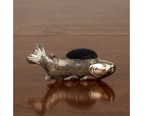 Continental silver pincushionmodelled as a fish, indistinct marks the the base and one to the side including a '900' mark, 13