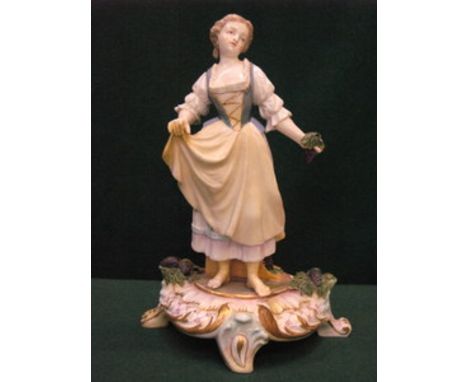 CONTINENTAL STYLE HANDPAINTED AND GLAZED CERAMIC FIGURINE 