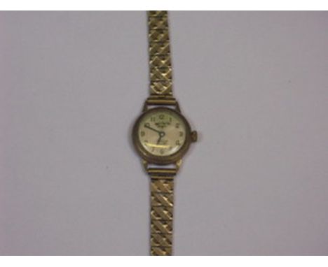 9ct GOLD ROTARY LADIES WRISTWATCH ON 9ct GOLD STRAP 