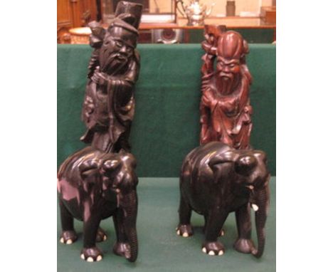 TWO CARVED ORIENTAL STYLE FIGURE FORM LAMP BASES AND PAIR OF CARVED EBONISED ELEPHANTS 