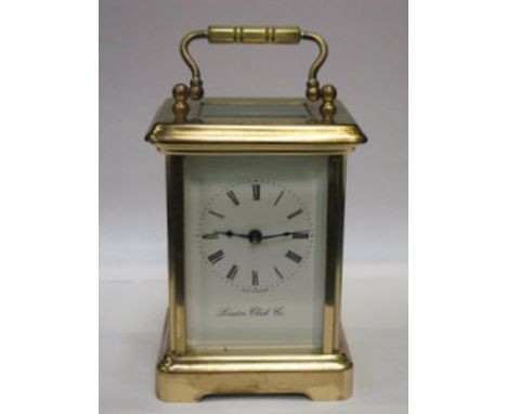 BRASS AND GLASS LONDON CLOCK CO. CARRIAGE CLOCK 