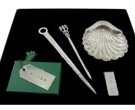 Silver meat skewer by Francis Howard Ltd, Sheffield 1969, silver scallop shell dish by Atkin Brothers, Sheffield 1901, silver