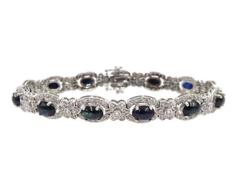 18ct white gold cabochon sapphire and diamond flower link bracelet, stamped 750, total sapphire weight approx 7.80 carat