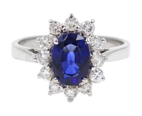 18ct white gold oval sapphire and diamond cluster ring, hallmarked, sapphire approx 1.40 carat, total diamond weight approx 0