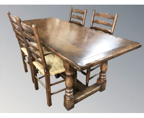 A Titchmarsh &amp; Goodwin reproduction oak refectory dining table, 185 cm x 81 cm x 76 cm, together with a matching set of f