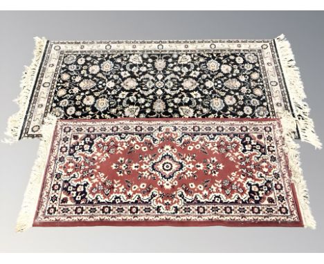 Two machine made Persian designed rugs, largest 177 cm x 84 cm.