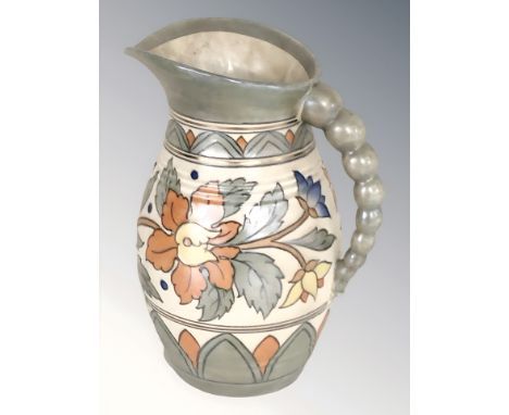 A Charlotte Rhead for Crown Ducal jug, height 22 cm.