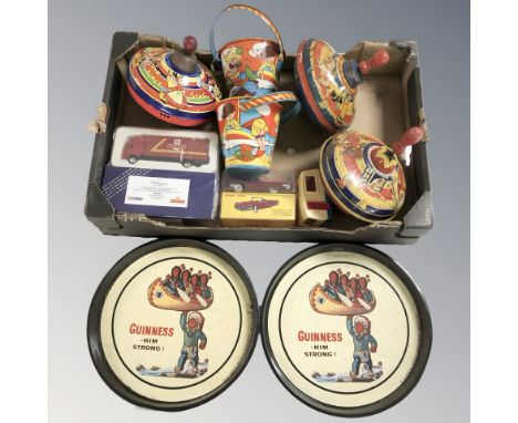 A group of vintage toys including tin plate spinning tops, buckets, together with a Corgi Royal Mail die cast wagon, further 