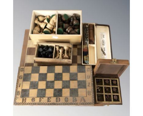 Two chess boards, turned boxwood chess set, a further modern set, German recorder in box. (1 box)