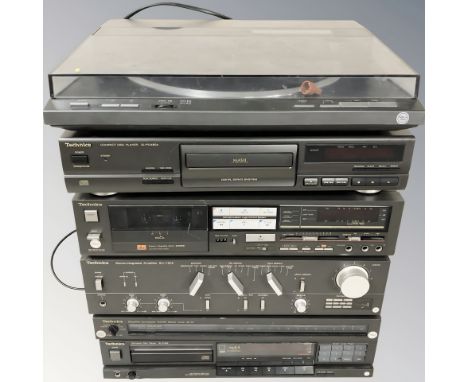 A group of Technics hi-fi separates including turntable, CD player, amplifier, cassette deck, etc.