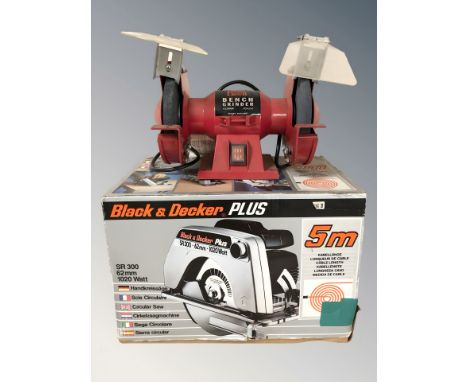 A Black & Decker Plus circular saw, in box, and a Power Devil bench grinder.