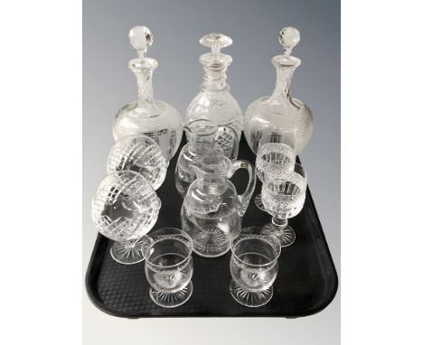 A cut crystal decanter, a further pair of etched decanters, pair of jugs and three various pairs of drinking glasses.