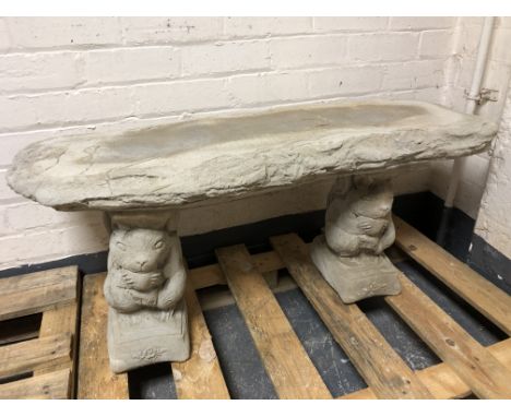 A rustic concrete garden bench on squirrel supports, length 101 cm 