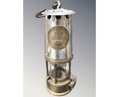 An Eccles Protector Type G6RS miner's safety lamp.
