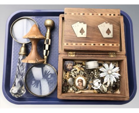 An inlaid hardwood playing card box containing Wills cigarette cards, a further table box containing assorted costume jewelle