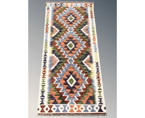 A Chobi Kilim runner, 142 cm x 68 cm 