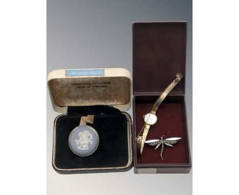 A lady's 9ct gold Rotary wristwatch with 9ct gold integral bracelet, together with a Jasperware circular brooch and a silver 