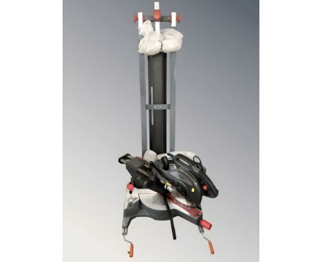 A Performance Redeye 255mm slide compound mitre saw, with instructions and collapsible stand.