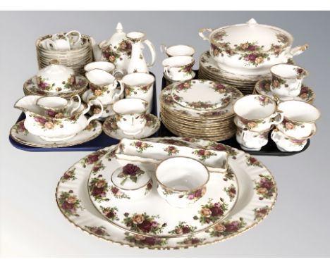 Approximately ninety pieces of Royal Albert Old Country Roses tea, dinner and cabinet porcelain. CONDITION REPORT: Twin handl