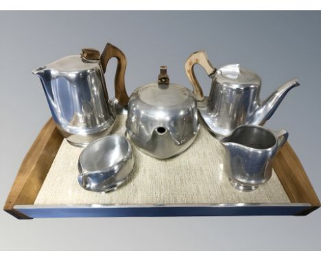 A five piece Picquot Ware tea and coffee service, on twin handled tray.