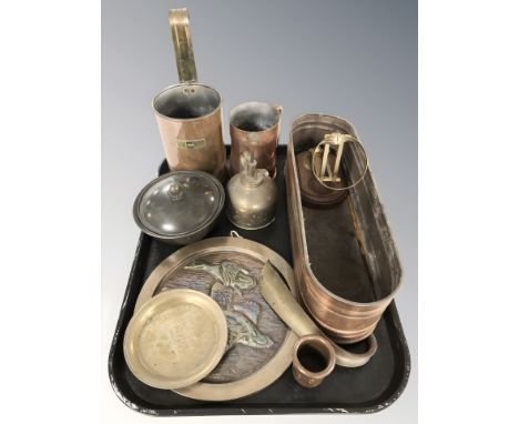 Brass and copper wares including measure, tankard, oil can, wall plaque, planter, etc.