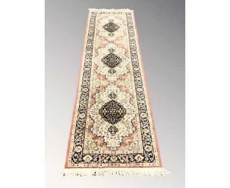 A machine made Persian design runner, 287 cm x 75 cm 
