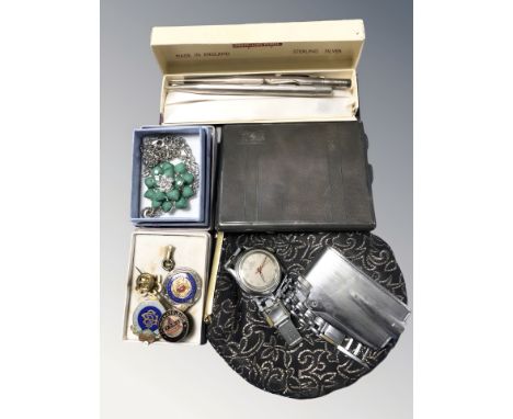 A silver cigarette case with engine turned decoration, Northern Goldsmiths, Birmingham marks, a silver propelling pencil plus