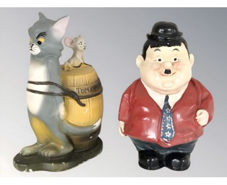 A ceramic Tom and Jerry money box, stamped copyright Metro Goldwyn Mayer, 1972, height 20 cm, together with a further Oliver 