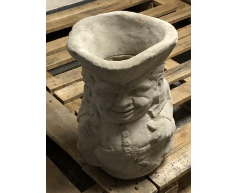 A concrete toby jug planter, height 43 cm 