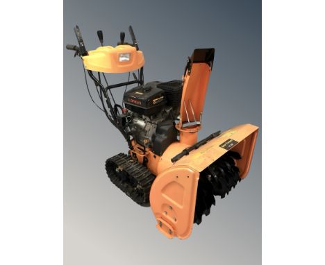A Rock Machinery Model 10 11HP snow thrower, with Loncin 337cc gasoline engine.