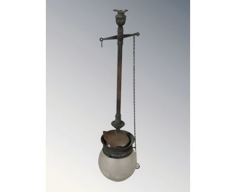 A late Victorian gas light fixture with shade, length 53 cm.