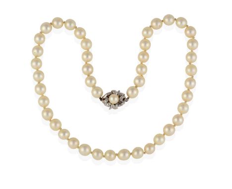 the forty-four cultured pearls knotted to a clasp composed of a single cultured pearl within a white foliate motif border set