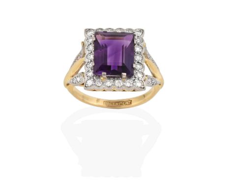 the rectangular step cut amethyst, in a white claw setting, within a border of eight-cut diamonds, in millegrain settings, to