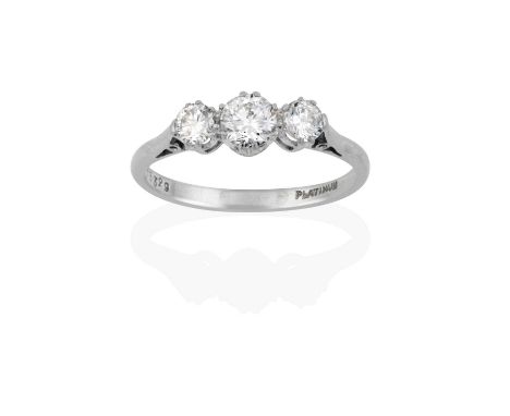 the graduated round brilliant cut diamonds in white claw settings, to a tapered shoulder plain polished shank, total estimate