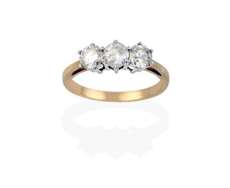 the round brilliant cut diamonds in white claw settings, to a yellow tapered shoulder plain polished shank, total estimated d