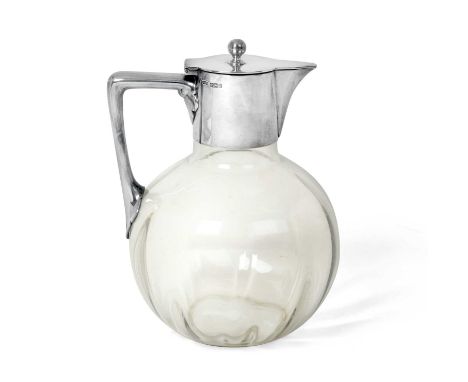 the glass body fluted globular, with plain silver-mounts, the hinged cover with ball finial, with angular handle18.5cm highCo