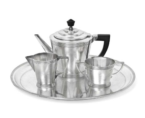 in the Art Deco style, each piece tapering and with reeded rim and base, comprising: a teapot, with ebonised handle and finia