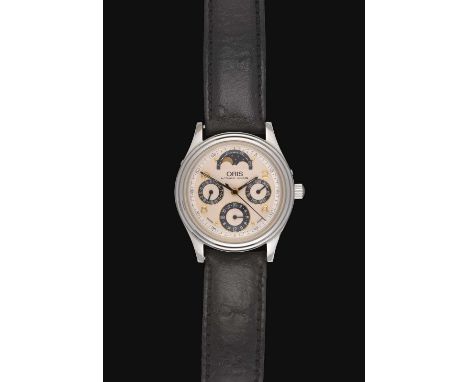 (calibre 7433) lever movement signed, engine turned silvered dial with Arabic numerals, three blue chapter dials for day, dat