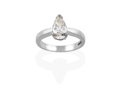 the pear-shaped diamond in a claw setting, to a tapered shoulder plain polished shank, estimated diamond weight 1.20 carat ap
