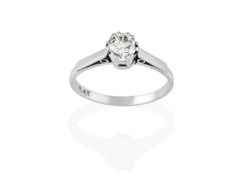 the round brilliant cut diamond in a white claw setting, to a tapered shoulder plain polished shank, estimated diamond weight