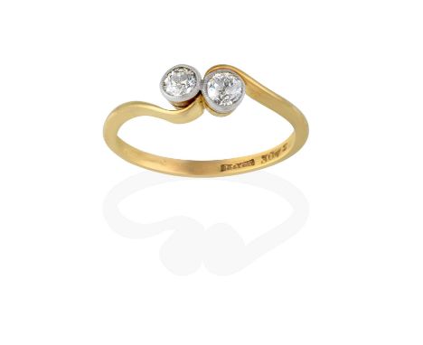 the two old cut diamonds in yellow millegrain settings, to a twist shoulder plain polished shank, total estimated diamond wei