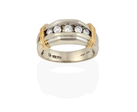the graduated round brilliant cut diamonds in white channel settings, terminating to a yellow bar, to a plain polished shank,