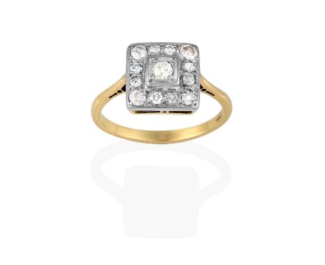 the raised old cut diamond in a white square setting, within a border of old cut diamonds, in claw settings, to a yellow tape