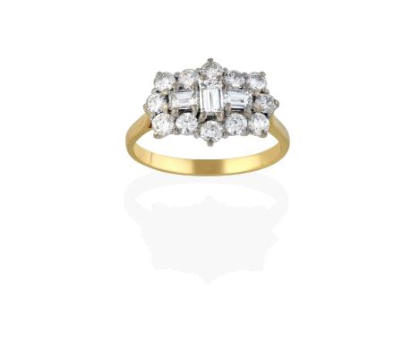 a cross motif formed of baguette cut diamonds within a border of round brilliant cut diamonds, in white claw settings, to a y