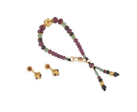 the bracelet composed of faceted ruby, emerald and sapphire beads spaced by yellow beadwork links, terminating to similarly s