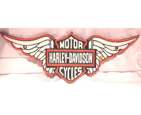 Cast iron Harley Davidson winged plaque, L: 30 cm. P&amp;P Group 2 (£18+VAT for the first lot and £3+VAT for subsequent lots)