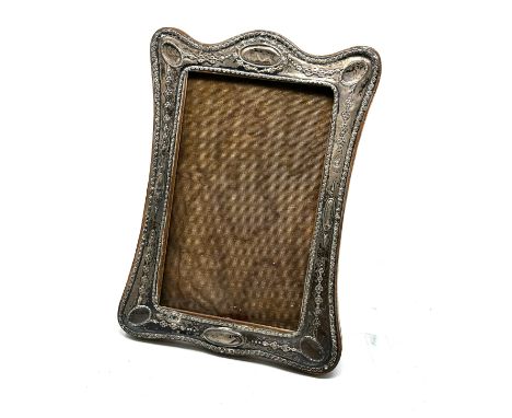 Antique silver picture frame measures approx 17.5cm by 13cm 