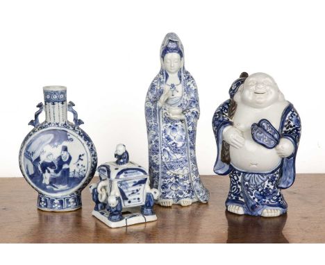 Group of four piecesChinese and Japanese, 19th/20th Centuryincluding a standing blue and white porcelain model of Guanyin, 30