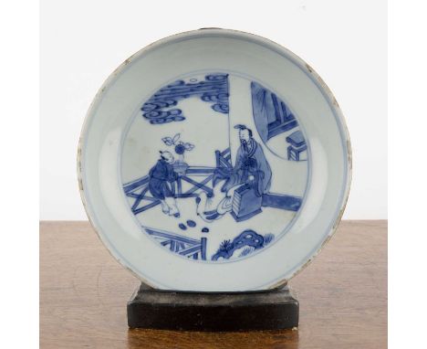 Blue and white porcelain saucer dishChinese, Kangxi period (1662-1722)painted with a scholar and attendant, 16cm diameter   F